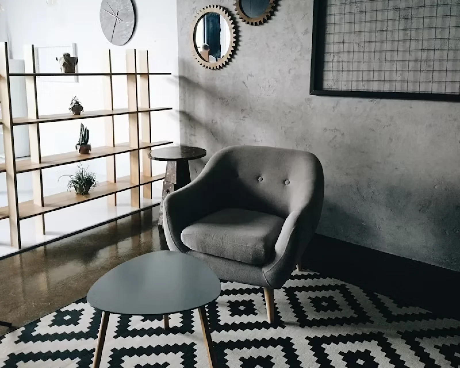 A group of colorful couches sitting on top of a tiled floor.